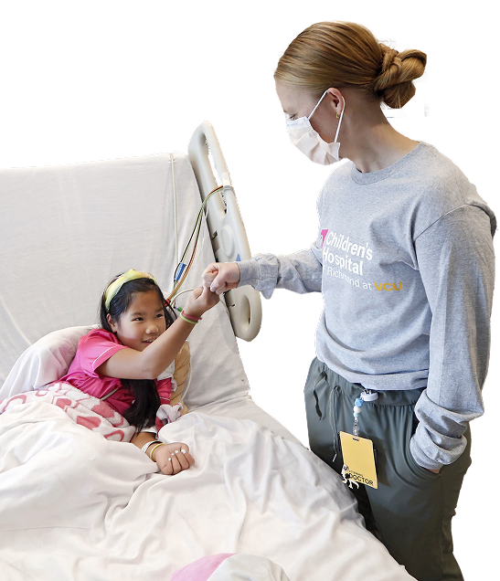 Nurse greeting a young patient